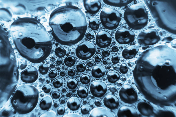 patrón de burbuja azul como una estructura de espuma en una superficie líquida
 - Foto, Imagen