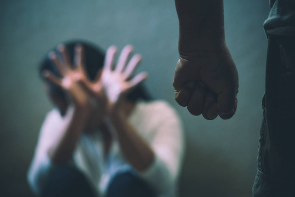 Man beating up his wife illustrating domestic violence - Zdjęcie, obraz