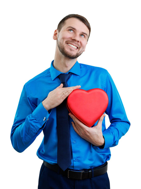 Elegant man with valentines gift box in the shape of heart. - Фото, зображення