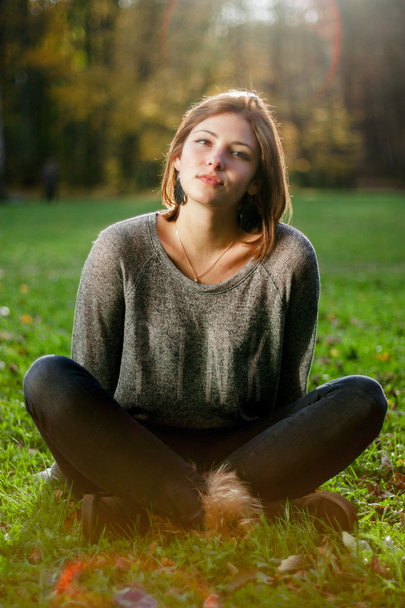 Portrait of young beautiful woman on green background summer nature. - Φωτογραφία, εικόνα