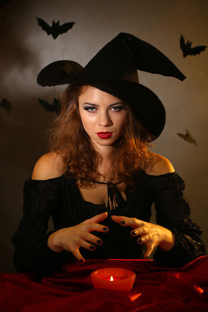 Halloween witch on dark background - Фото, изображение