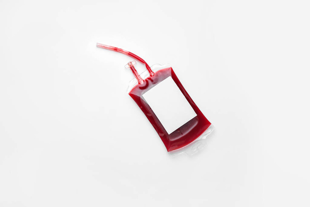 Blood pack for transfusion on white background - Fotoğraf, Görsel