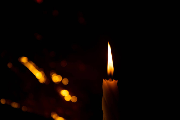 burning candles on dark background - Фото, изображение