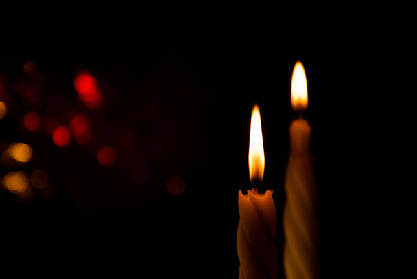 burning candles on dark background - Valokuva, kuva