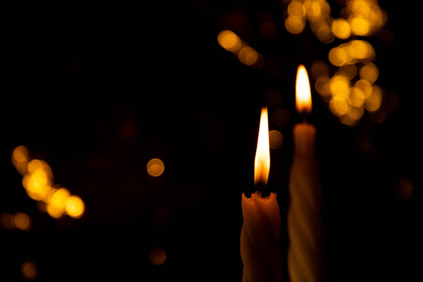 burning candles on dark background - Φωτογραφία, εικόνα