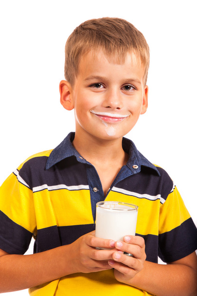 Young boy has moustache of milk on his lips - Fotó, kép