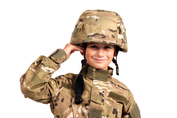 Saluting soldier. Young boy - Valokuva, kuva