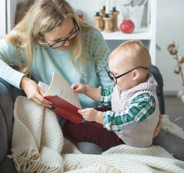 A woman and her son are reading - Photo, Image