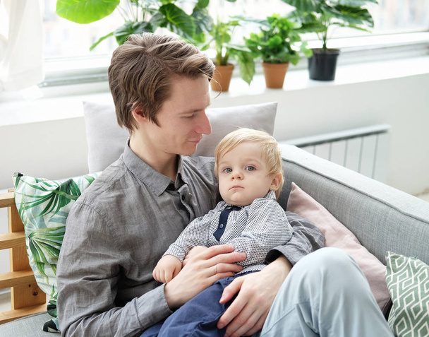 Young dad with his son at home, have a great time together, happy time, young family - Foto, Imagen