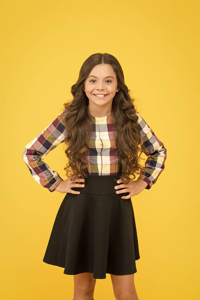 Fashion never goes out of school. Little schoolchild in formal fashion yellow background. Small vogue model with fashion look. Stay in fashion be happy. Back to school - Photo, image