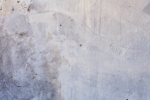 アスファルトのクローズアップ、壁の湿式コンクリートテクスチャ。生石膏壁の背景. - 写真・画像