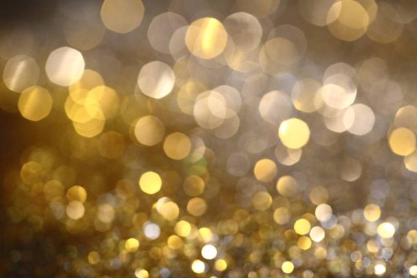 Abstract Golden Bokeh background with shining defocus sparkles - Photo, Image