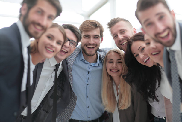 close up.a team of young business people looking at the camera. - Zdjęcie, obraz