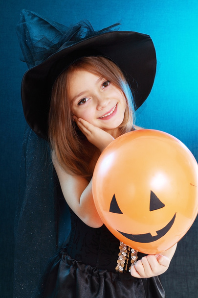 Girl in witch halloween costume - Fotografie, Obrázek