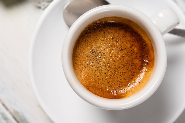 Cup of creamy italian espresso  - Photo, Image