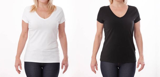 T-shirt design and people concept - close up of woman in blank black and white t-shirt, shirt front isolated. Mock up. - Foto, Bild