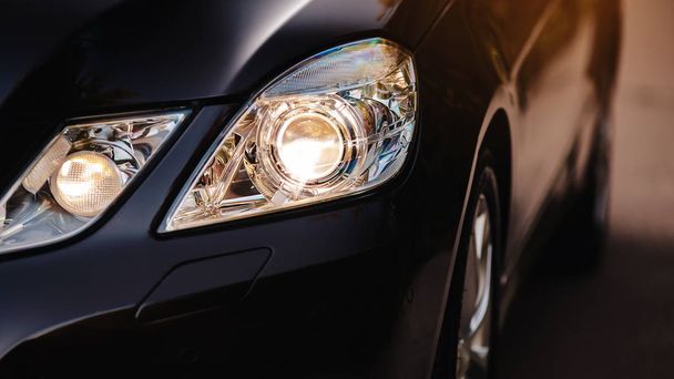 Modern luxury car headlights closeup. - Photo, Image