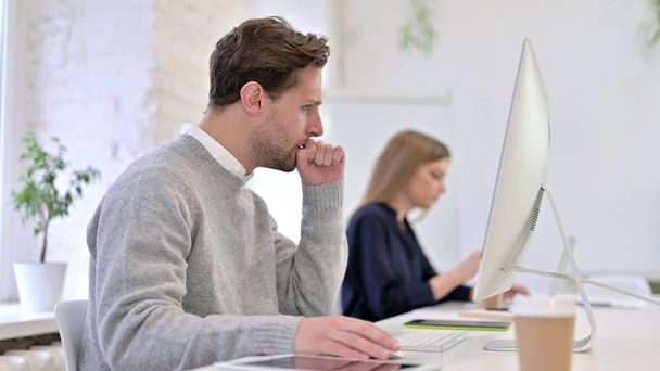 Man Working on Desktop and Coughing in Office - Photo, Image