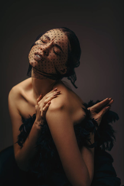 beauty elegant girl posing in black veil - Foto, Imagem
