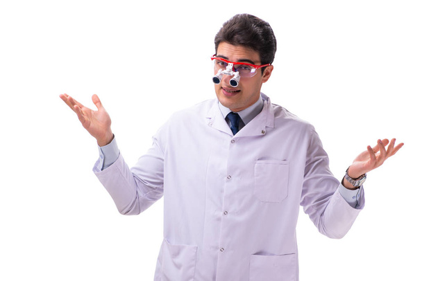 Joven doctor masculino con lupa aislada en blanco
 - Foto, imagen