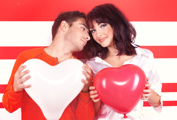 Charming love couple with heart-shaped balloon - Foto, Bild