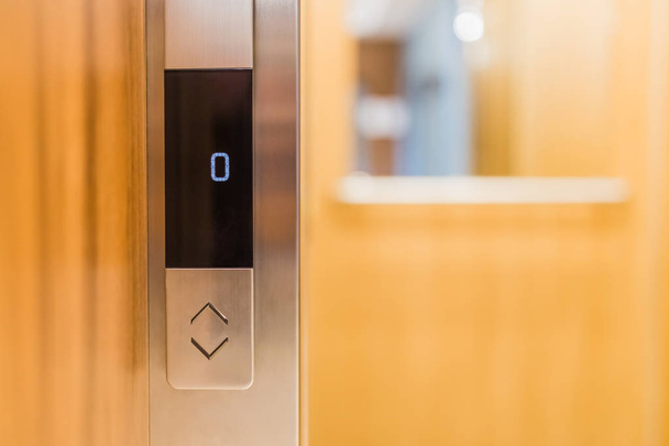 Elevator up and down buttons modern keypad. - 写真・画像