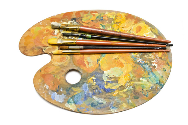 Paint brushes on a palette - Photo, Image