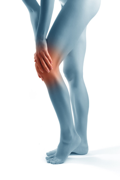 Acute pain in a knee at the young women - Photo, Image