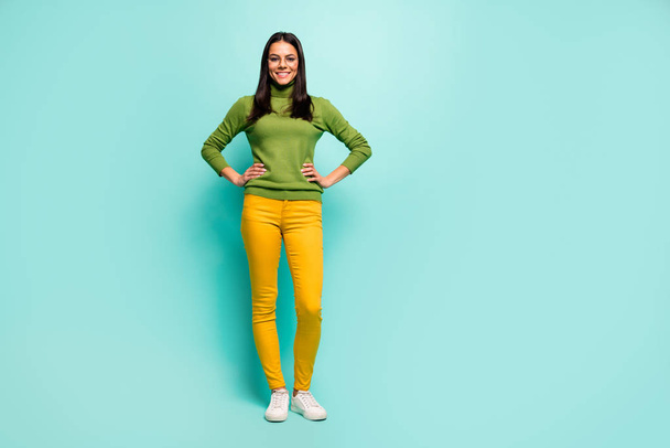 Full length body size view of her she nice attractive lovely pretty charming cheerful cheery content girl standing isolated on bright vivid shine vibrant blue green turquoise color background - Photo, Image
