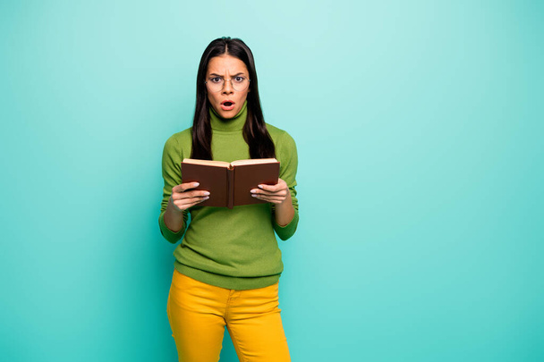 Portrait of her she nice-looking attractive lovely intellectual dissatisfied girl nerd reading novel fake facts isolated on bright vivid shine vibrant blue green turquoise color background - Foto, immagini