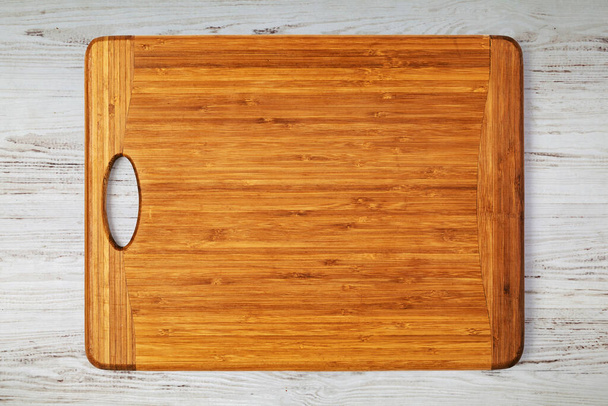 cutting board on a wooden table - Foto, imagen