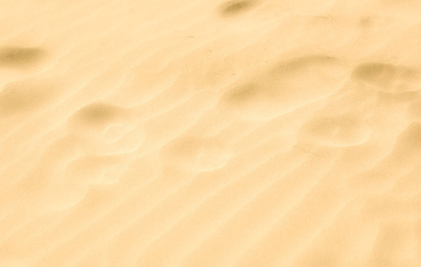 Zbliżenie tekstury tła piasku. - Zdjęcie, obraz