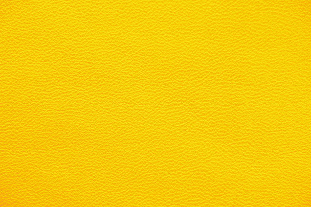 Текстура натуральной кожи желтого цвета крупным планом
. - Фото, изображение