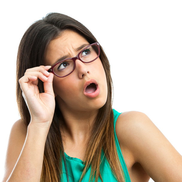 Teen girl wearing glasses looking at corner. - Photo, Image