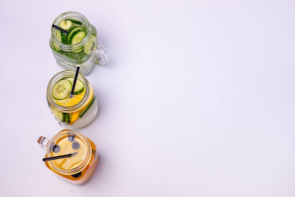 Glass Jars with Fresh Infused Water Made With Organic Fruits and Vegetables Healthy Detox Drink Top View Copy Space - Zdjęcie, obraz