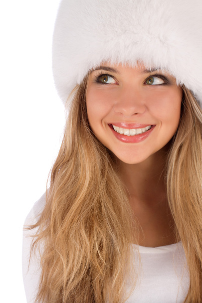 Attractive girl wearing white fur hat - Valokuva, kuva