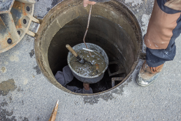 Sewer maintenance, looking down the manhole 2 - Photo, Image