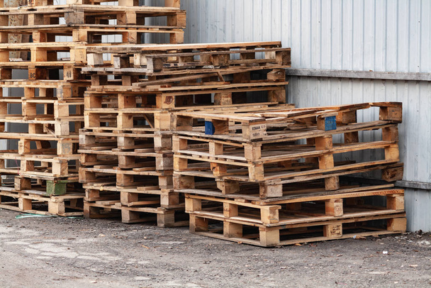 many old wooden pallets on the street - Photo, Image