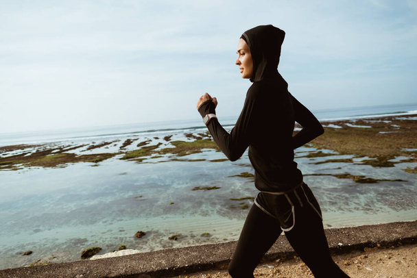 sport woman with head scarf running - Photo, Image