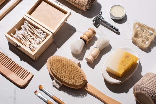 Top view of hygiene items on white background, zero waste concept - Fotografie, Obrázek