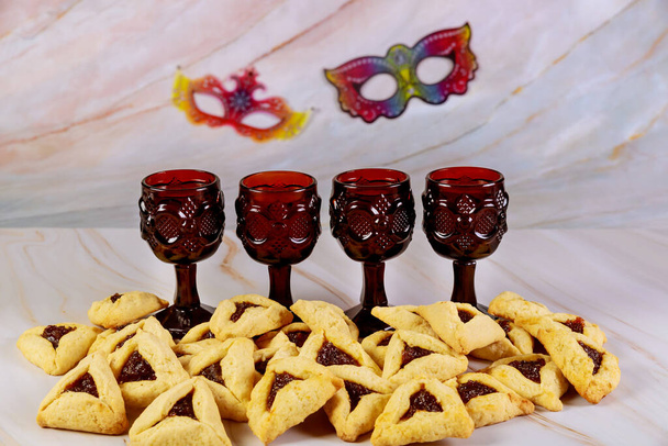 Jewish purim party table with wine and cookie. - Fotoğraf, Görsel