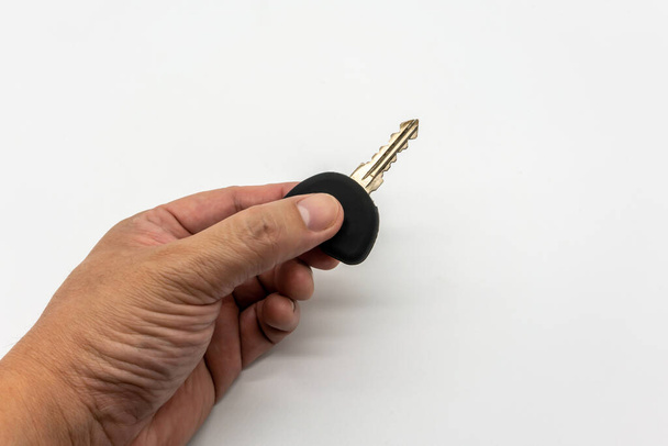 Czarny silikon do klucza samochodowego lub motocyklowego izolowany na biało  - Zdjęcie, obraz