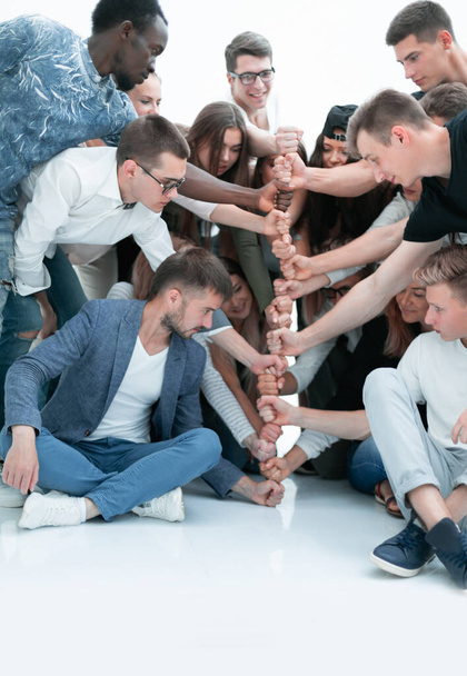 group of young people making a tower of fists. - Φωτογραφία, εικόνα
