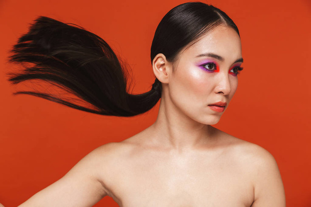 Beauty portrait of an attractive young topless asian woman - Fotó, kép