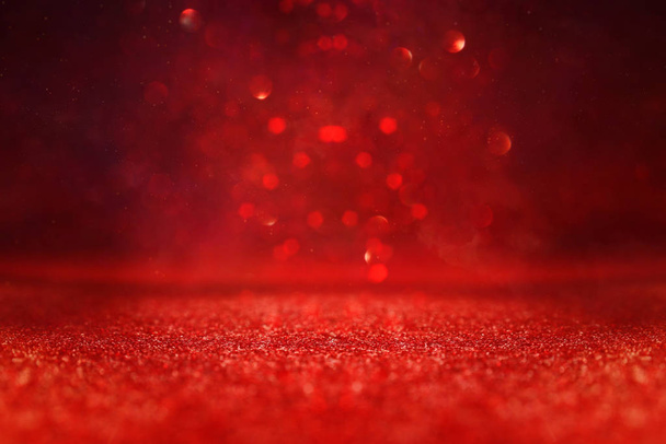 background of abstract red, gold and black glitter lights. defocused - Фото, зображення