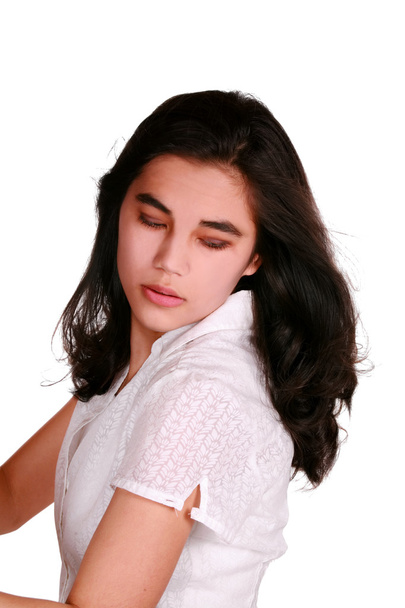 Beautiful teen girl eyes closed looking over shoulder - Valokuva, kuva
