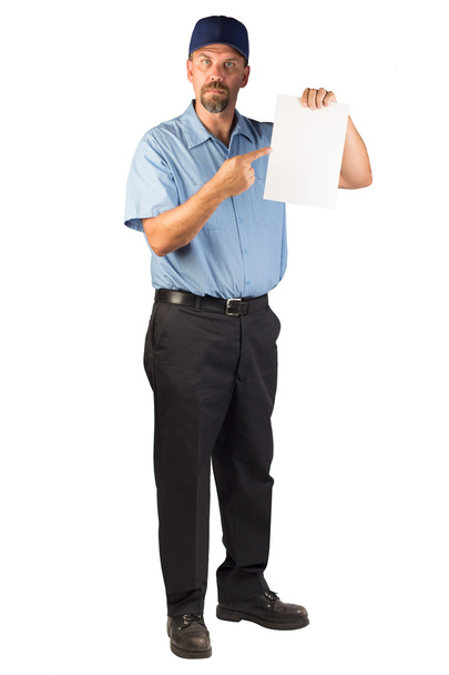 Hombre de construcción de pie y sosteniendo un documento en blanco - Señalando
 - Foto, imagen