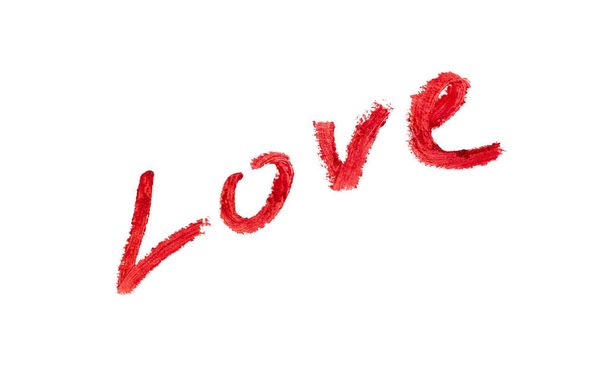 Love by lipstick. text icon for design decoration. Red hand-drawing lettering. Holiday element for Valentines day, romantic wedding, greeting card, print. Isolated on white background Doodle style - Φωτογραφία, εικόνα