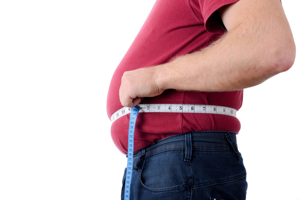άνδρα μέτρησης στομάχι - Φωτογραφία, εικόνα