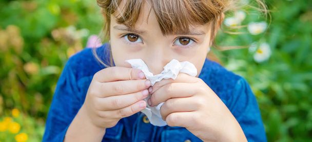 Seasonal allergy in a child. Coryza. Selective focus. - Photo, Image